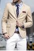 Picture of Beige jacket with white trousers
