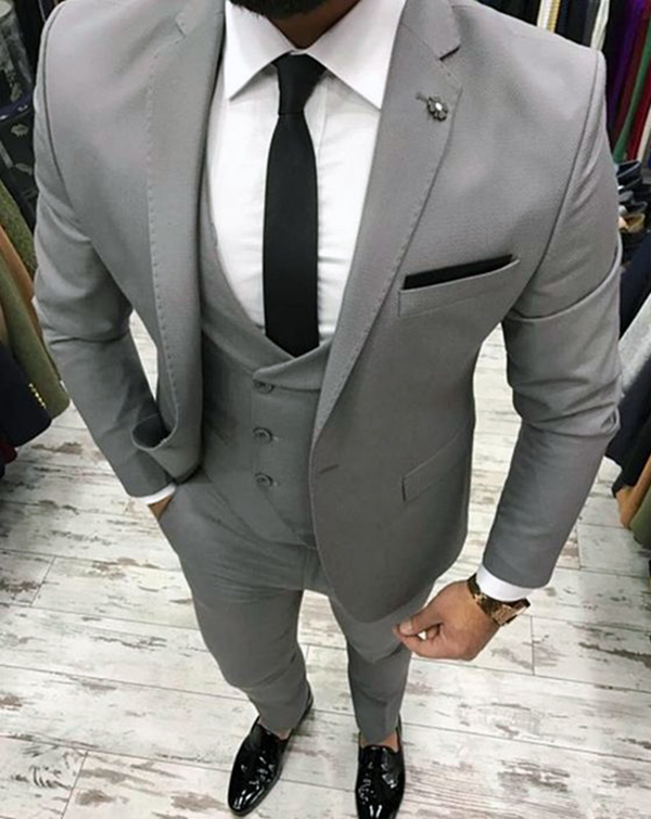 Grey three-piece suit