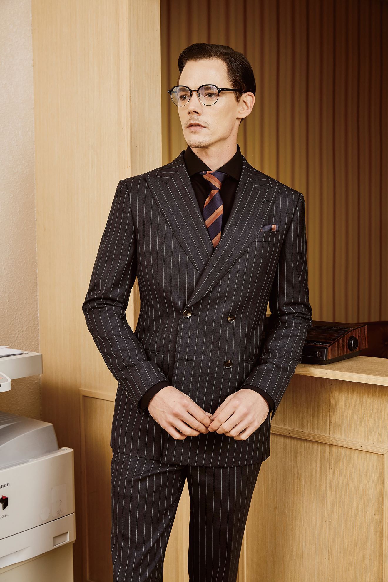 Picture of Dark grey pin-striped two piece suit